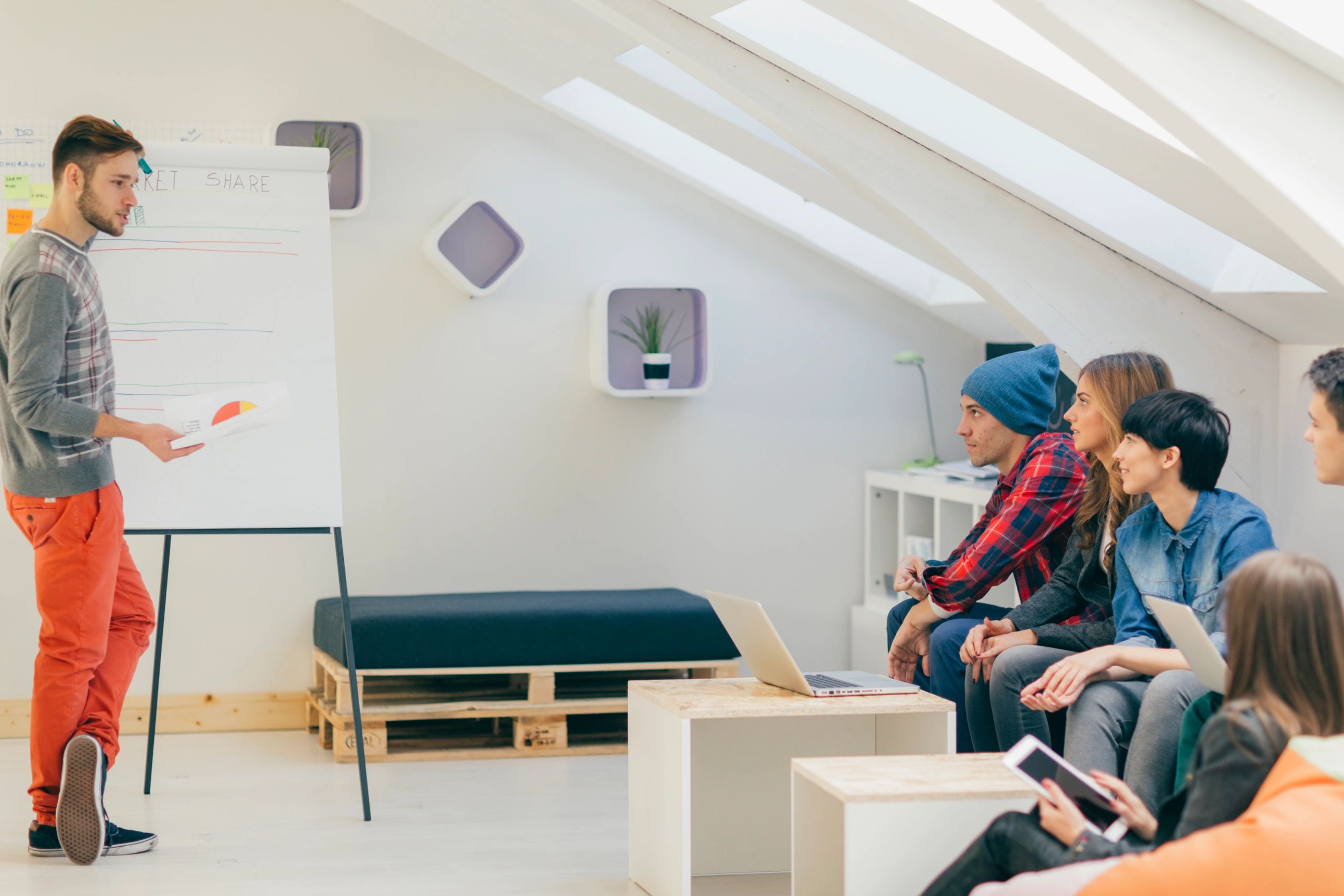 Small business team meeting with a presenter