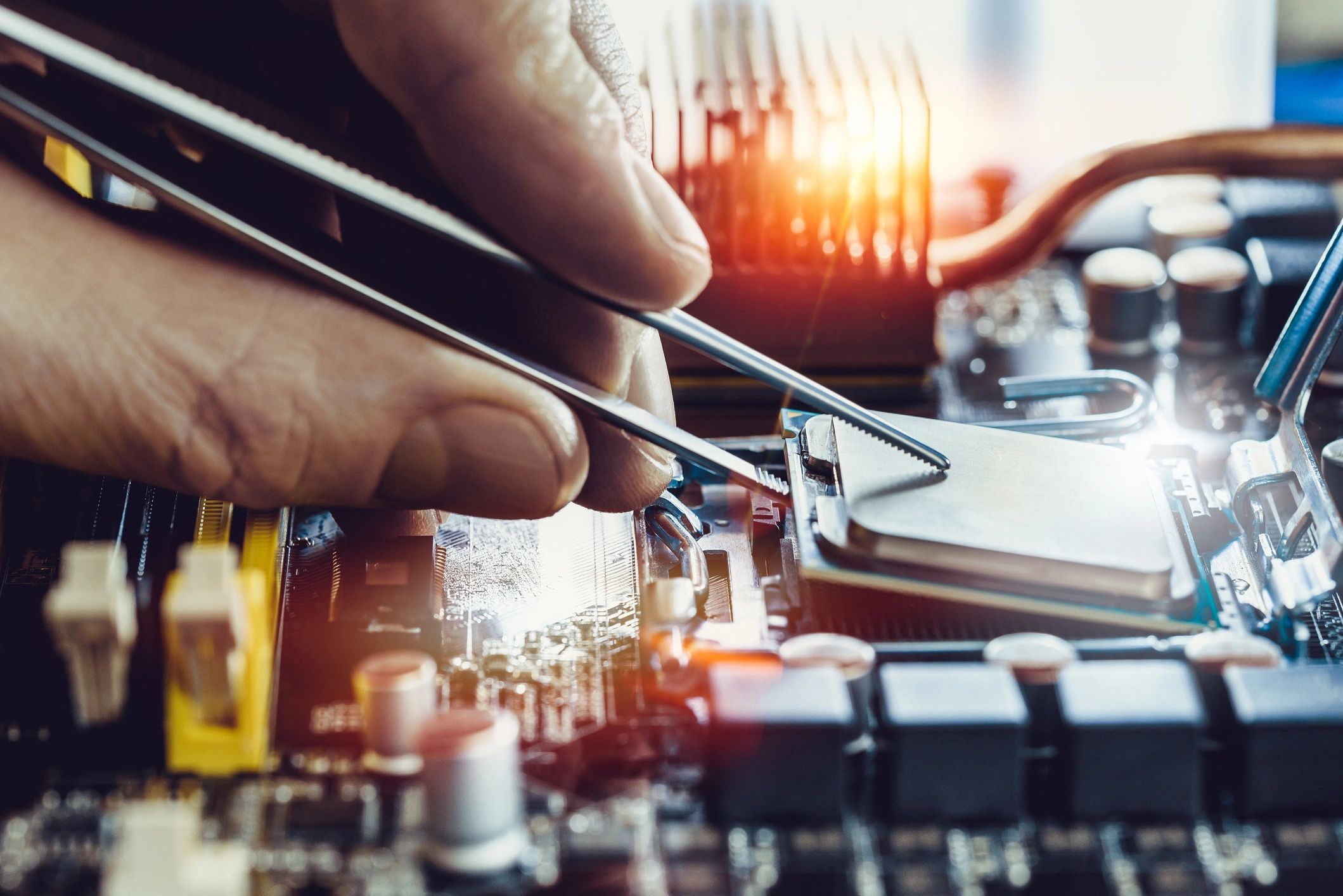 Technician repairing computer hardware
